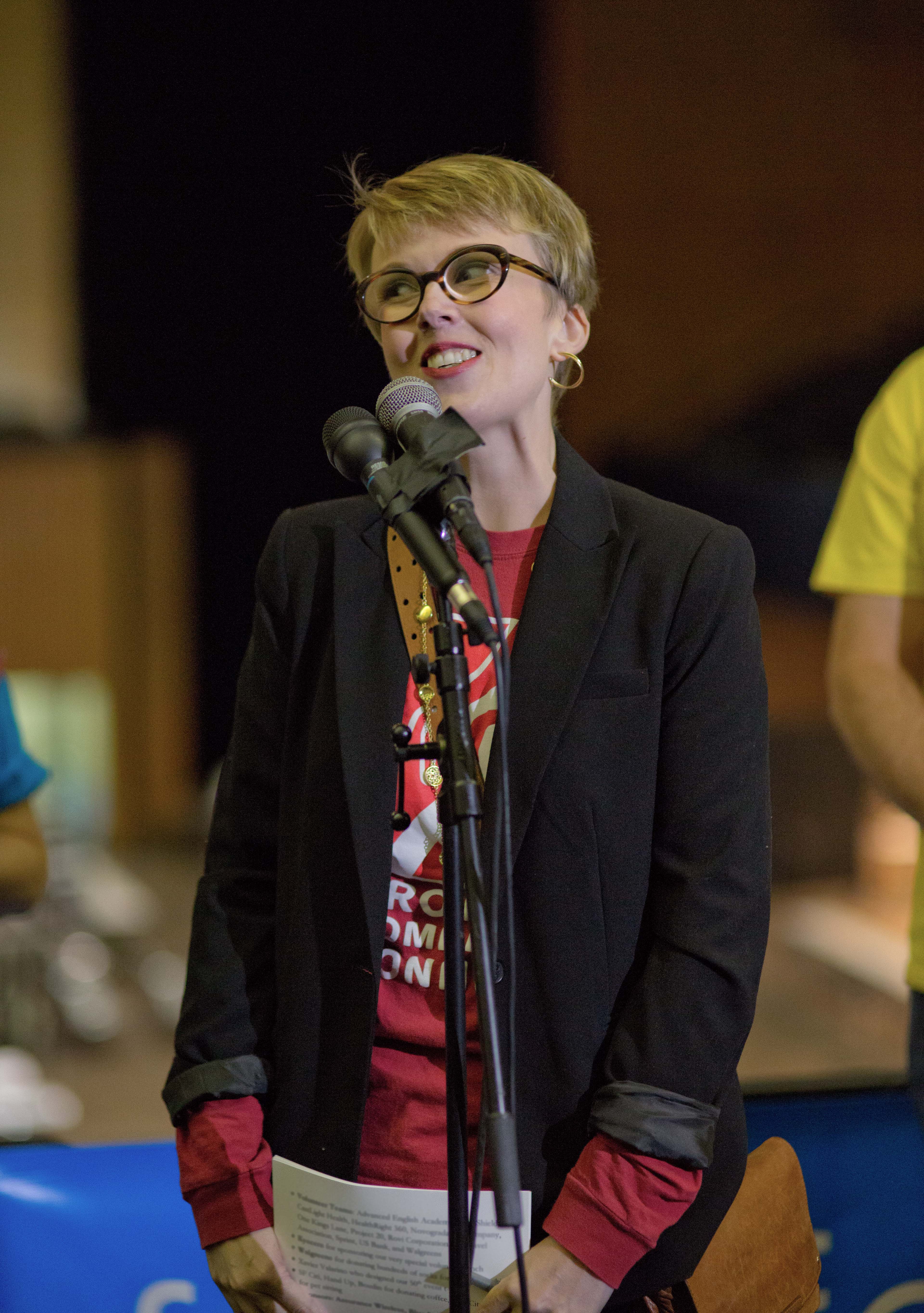 PHC Executive Director Kara Zordel addresses volunteers and supporters during PHC 50's volunteer rally